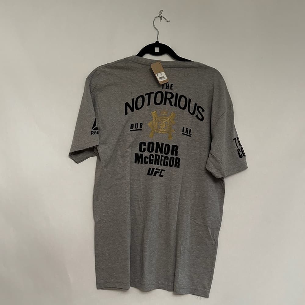 NWT Reebok UFC Conor McGregor Notorious Gold Emblem Graphic Tee Gray VNeck Large - Thumbnail 2