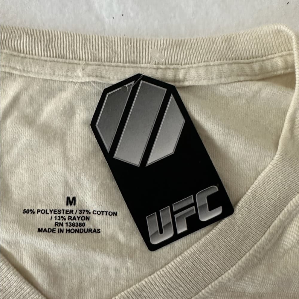 NWT UFC Women’s Cream V-Neck Graphic Tee Logo Short Sleeve Athletic Top Medium - Thumbnail 9