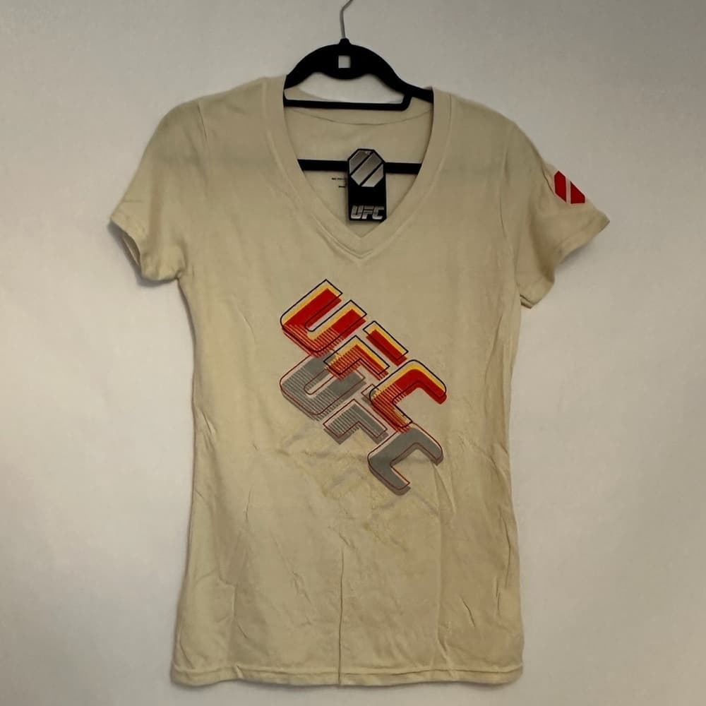 NWT UFC Women’s Cream V-Neck Graphic Tee Logo Short Sleeve Athletic Top Medium - Thumbnail 8