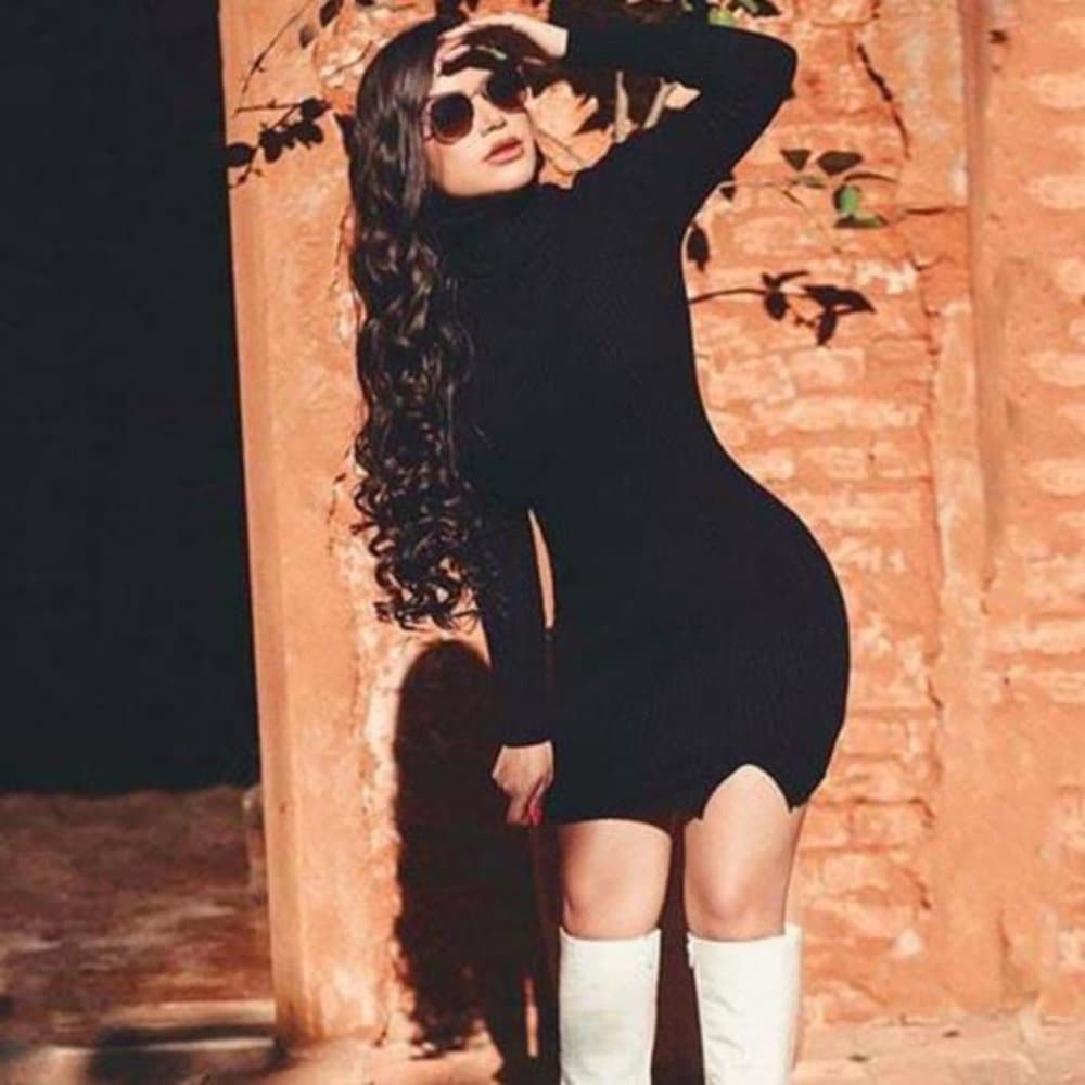 Black turtleneck long sleeve ribbed knit sweater dress split hem