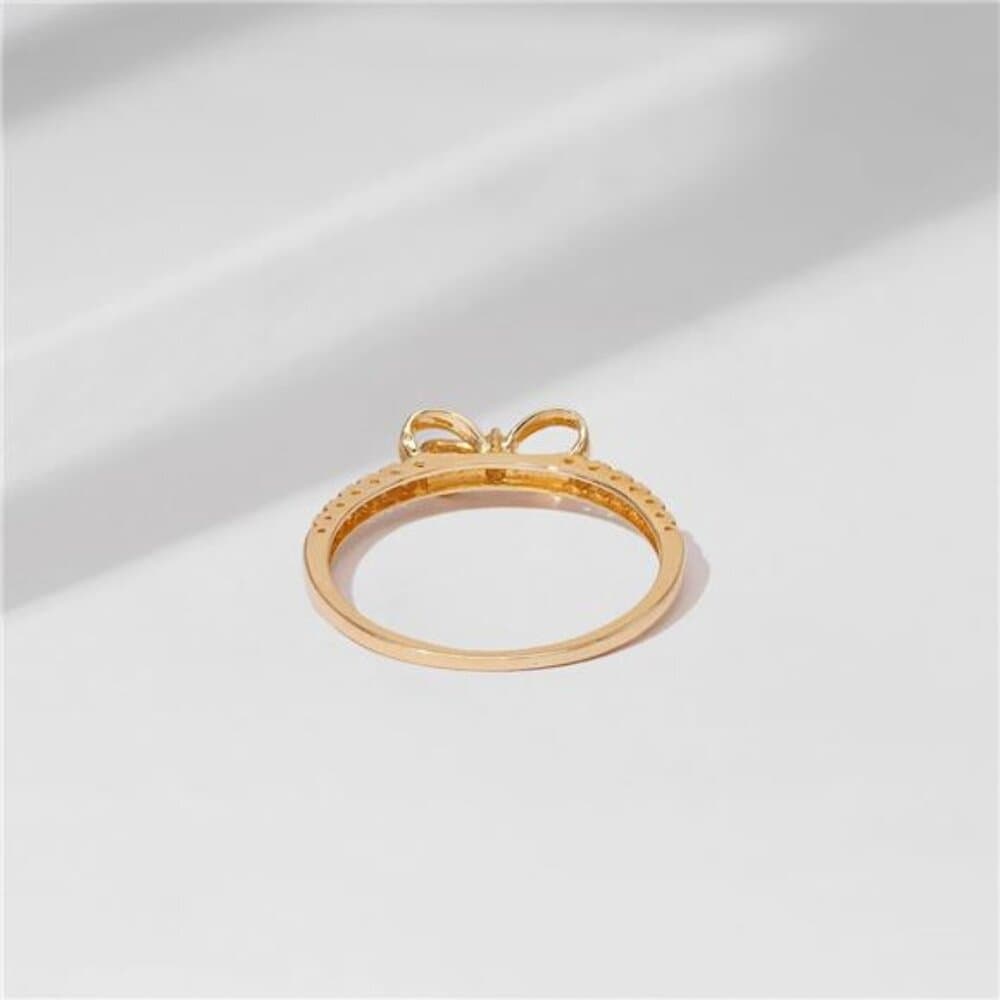 Amazon Essentials 10K Gold Dainty Bow Ring set with Round Cut Infinite Elements - Thumbnail 3