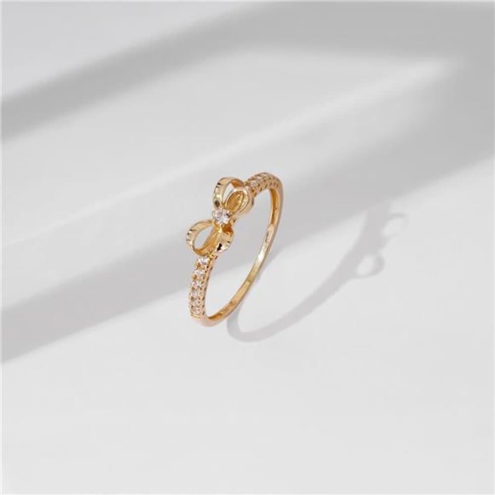 Amazon Essentials 10K Gold Dainty Bow Ring set with Round Cut Infinite Elements - Thumbnail 2