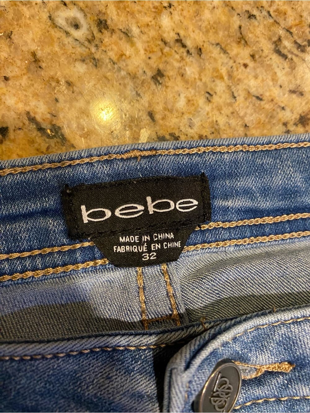 Bebe Light Wash Distressed Jeans with 'Peace + Love' Embroidery - Thumbnail 2