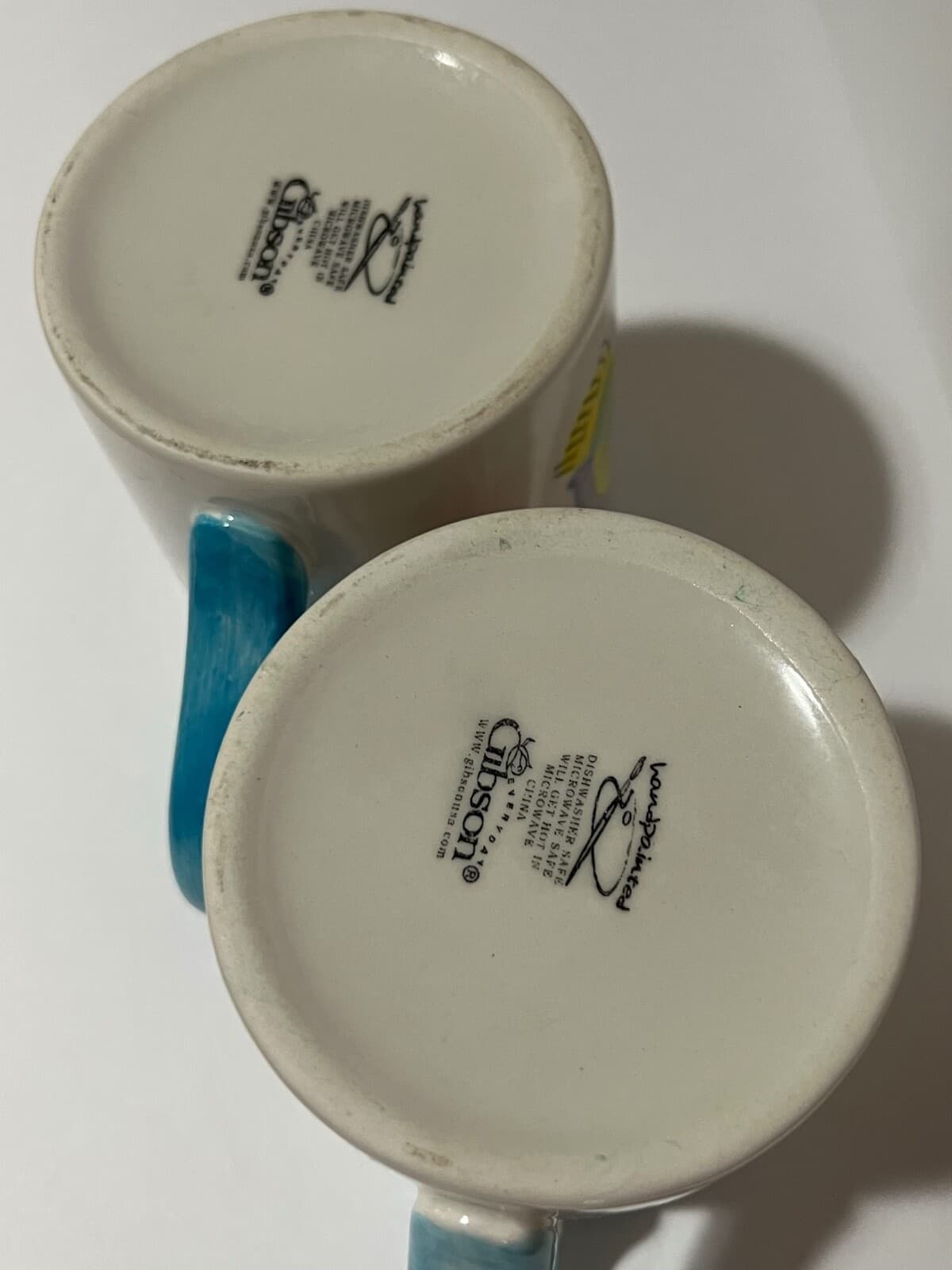 Pair of Handpainted White Mugs with Cartoon Fish and Blue Handle - Thumbnail 3