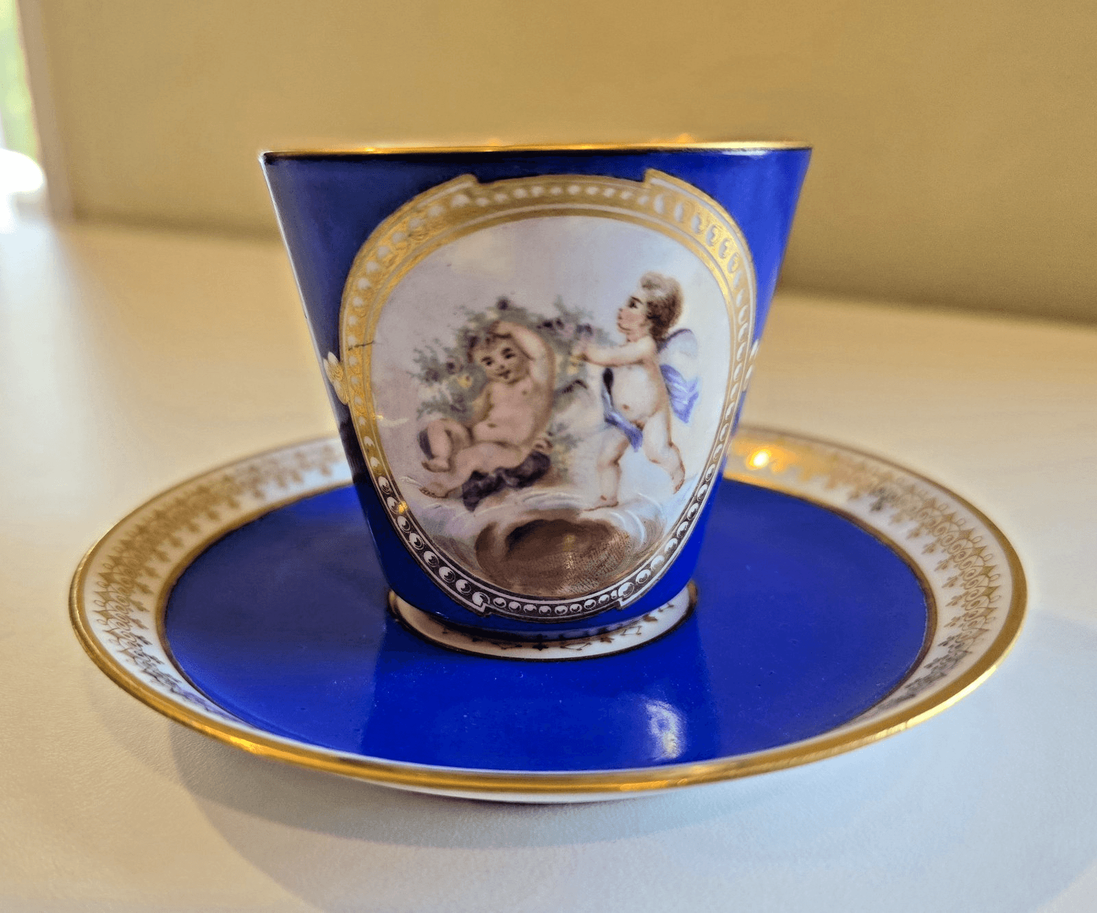 Antique French Painted Portrait Sevres Demitasse Cup Saucer Blue Portrait Cherub