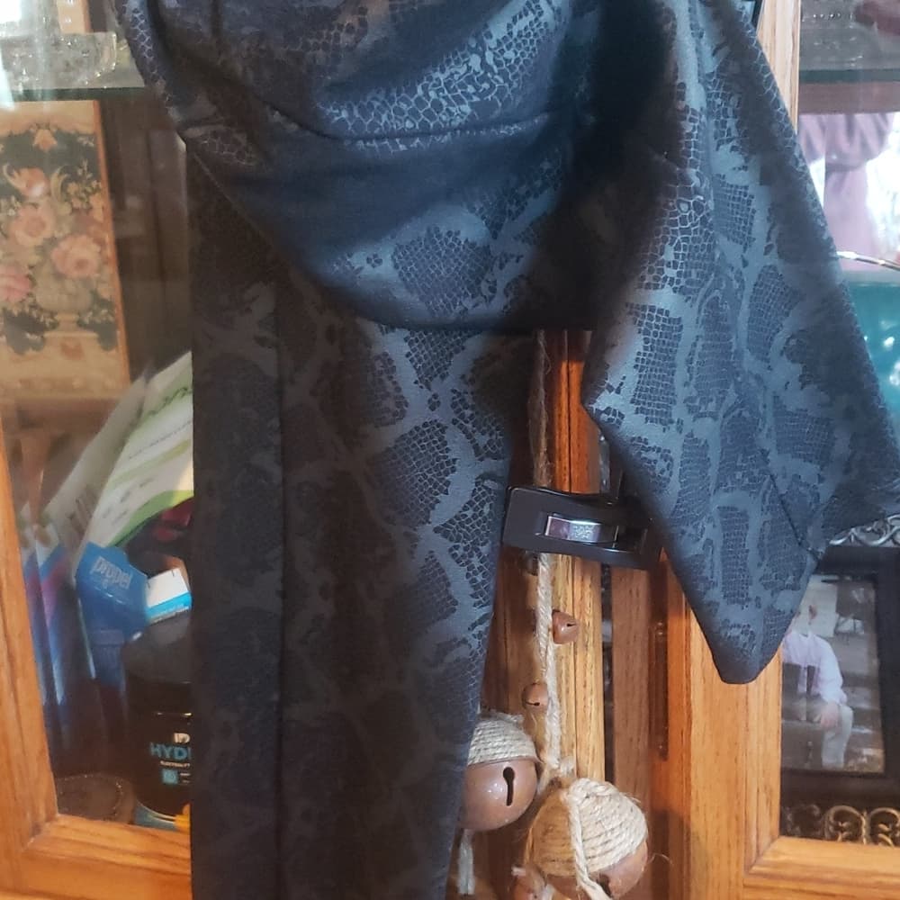 Black snakeskin stretch size 12