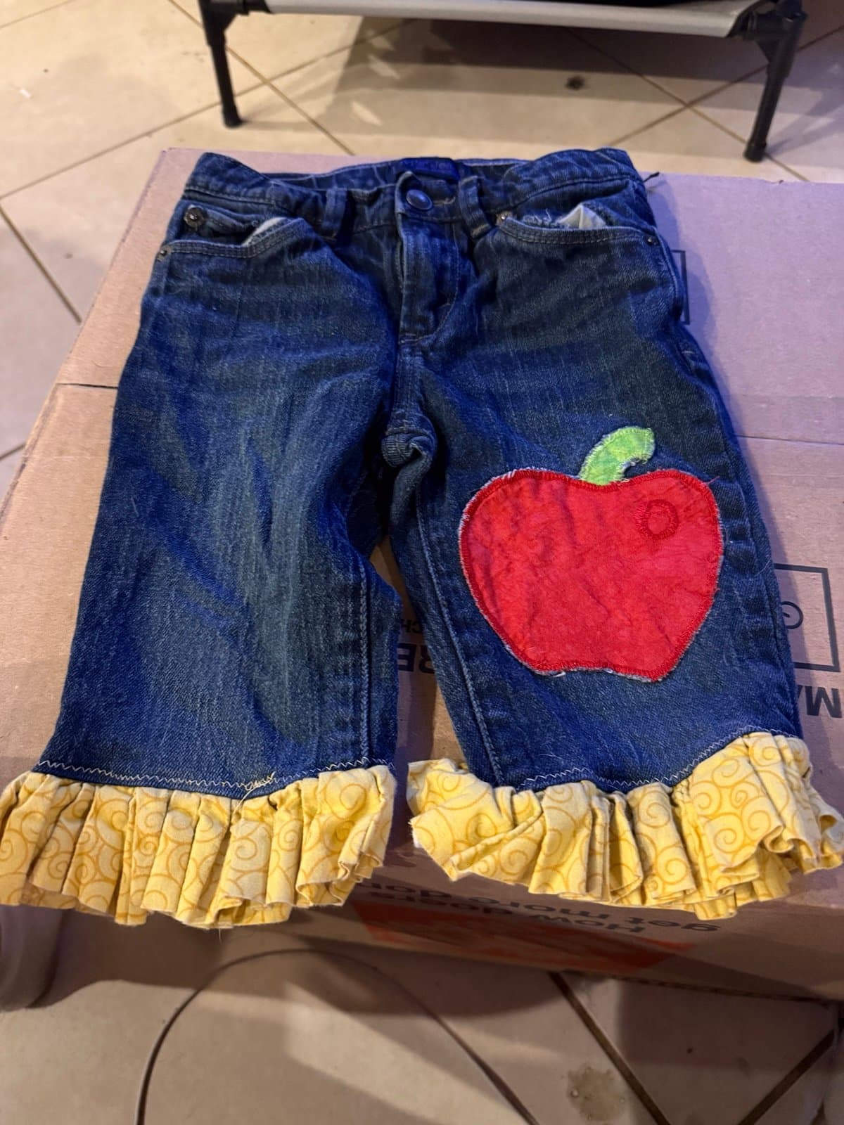 Levi's Jeans size 6 with apple patch and ruffle cuffs