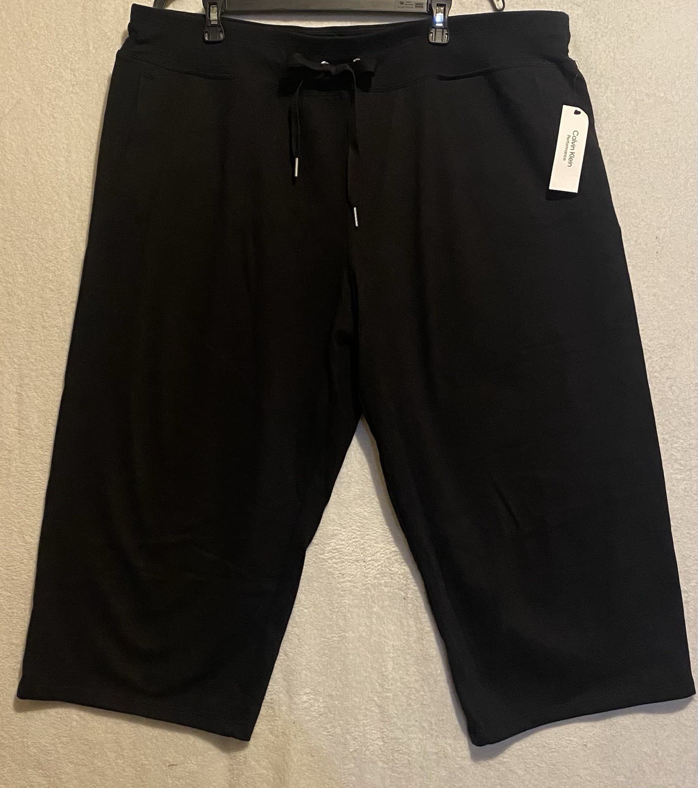 New Calvin Klein Womans Sz Large Crop Pants Pull On Pockets Black Knit NWT