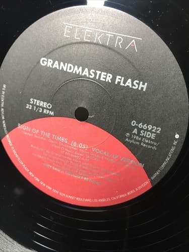 Grandmaster Flash GIRLS LOVE THE WAY HE SPINS 1985 Elektra 12" Single - Thumbnail 3
