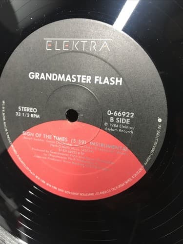 Grandmaster Flash GIRLS LOVE THE WAY HE SPINS 1985 Elektra 12" Single - Thumbnail 4
