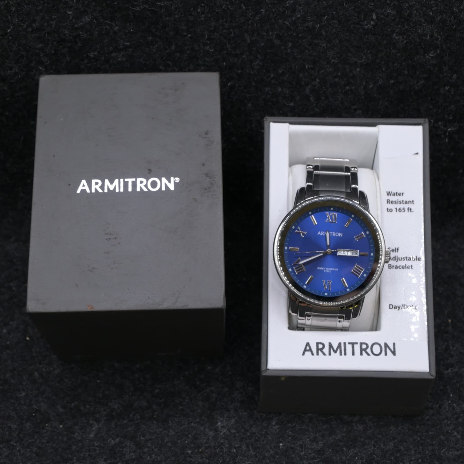Armitron watch ,PC33 20/4935sv,blue dial with day/date, clasp band