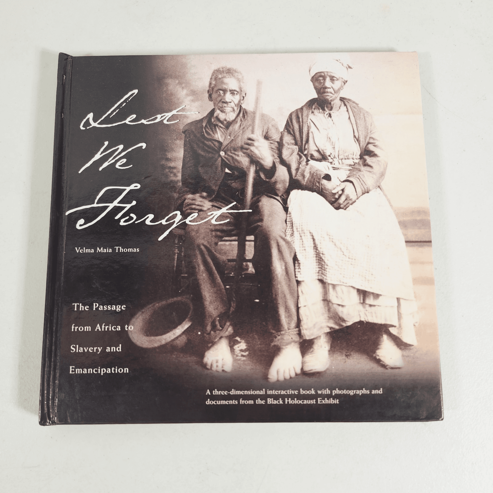 Lest We Forget The Passage from Africa Hardcover by Thomas Velma Maia