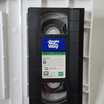 Christmas Movie VHS Jingle All The Way starring Arnold Schwarzenegger - Thumbnail 2