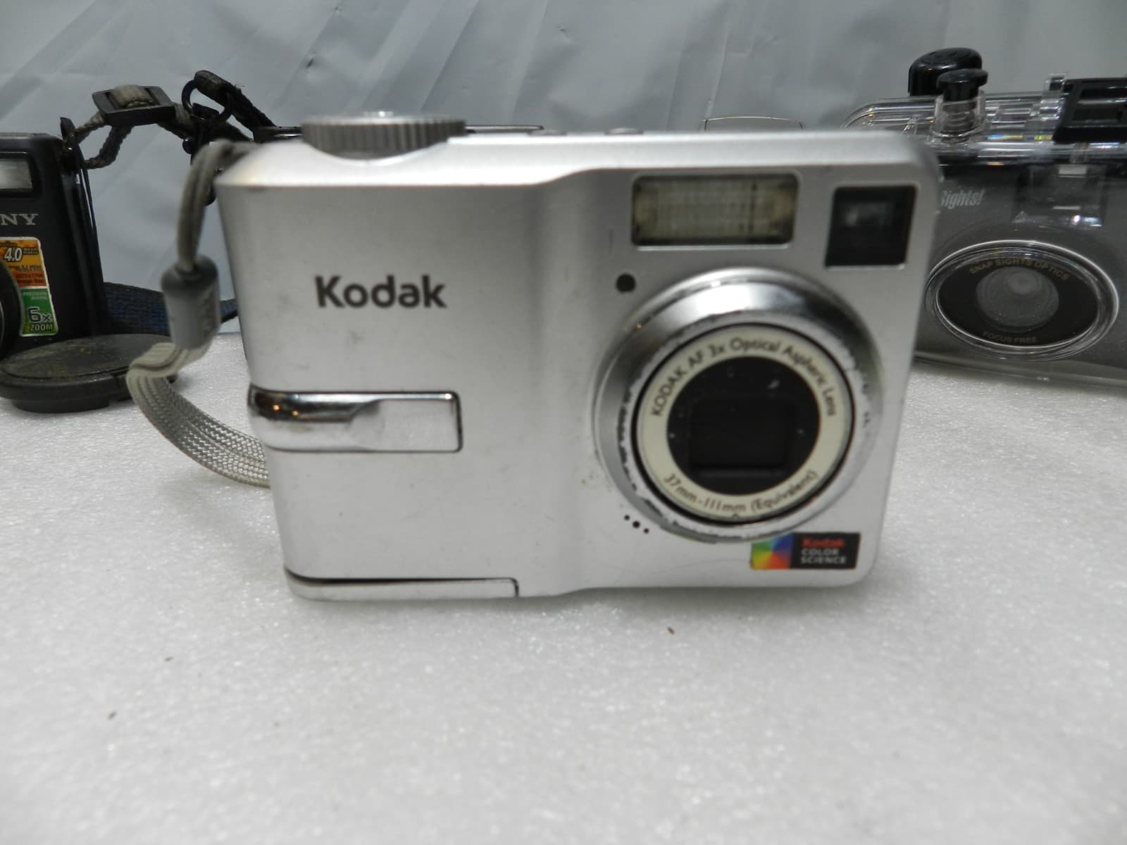 7 Assorted Digital Compact Cameras Olympus Kodak Sony Nikon (E77K) - Thumbnail 4