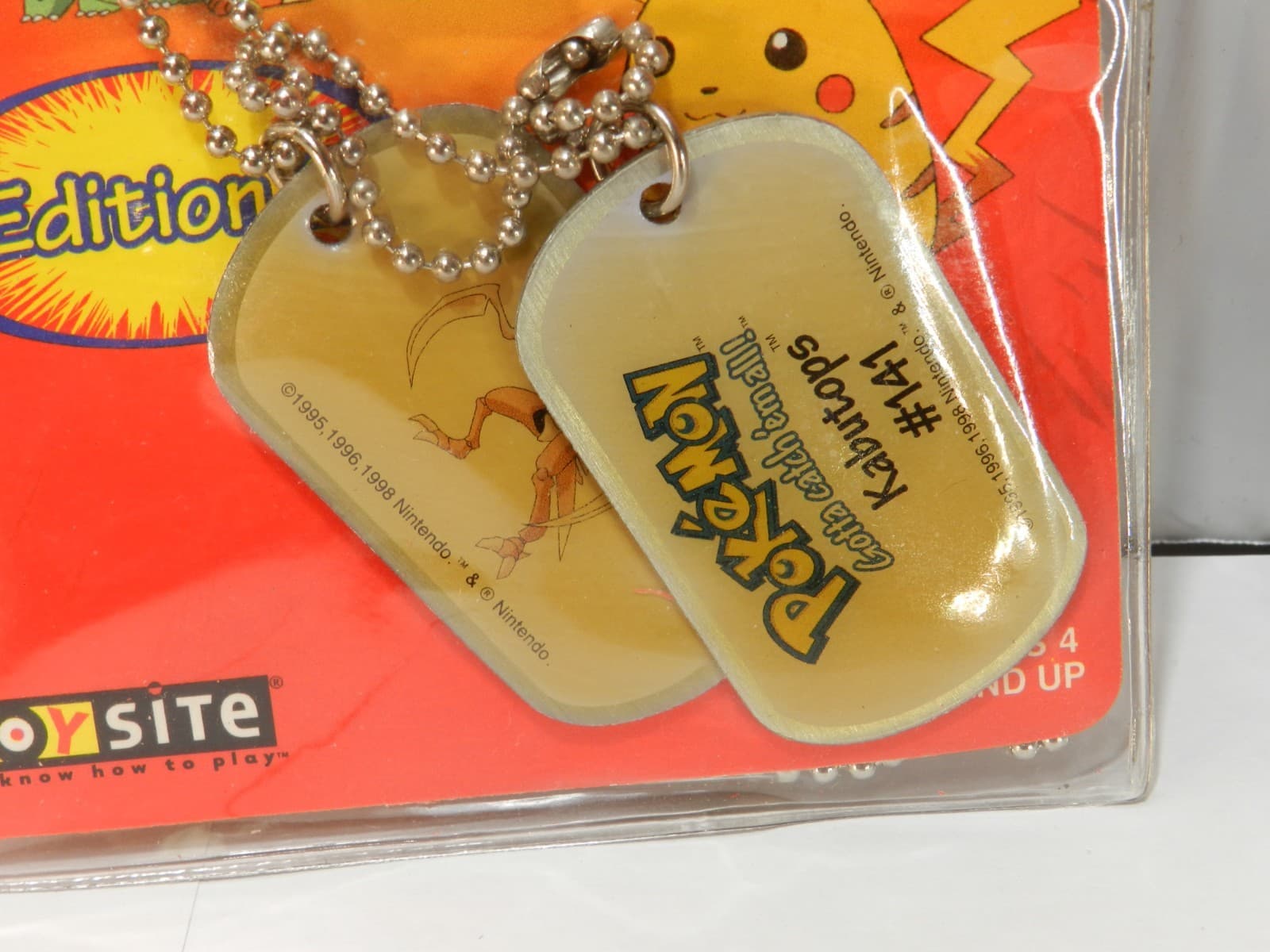 Vintage Lot Of 4 Pokémon Dog Tags 1999 (Onix , Raichu, Kabutops, Tauros) X69JJ - Thumbnail 4