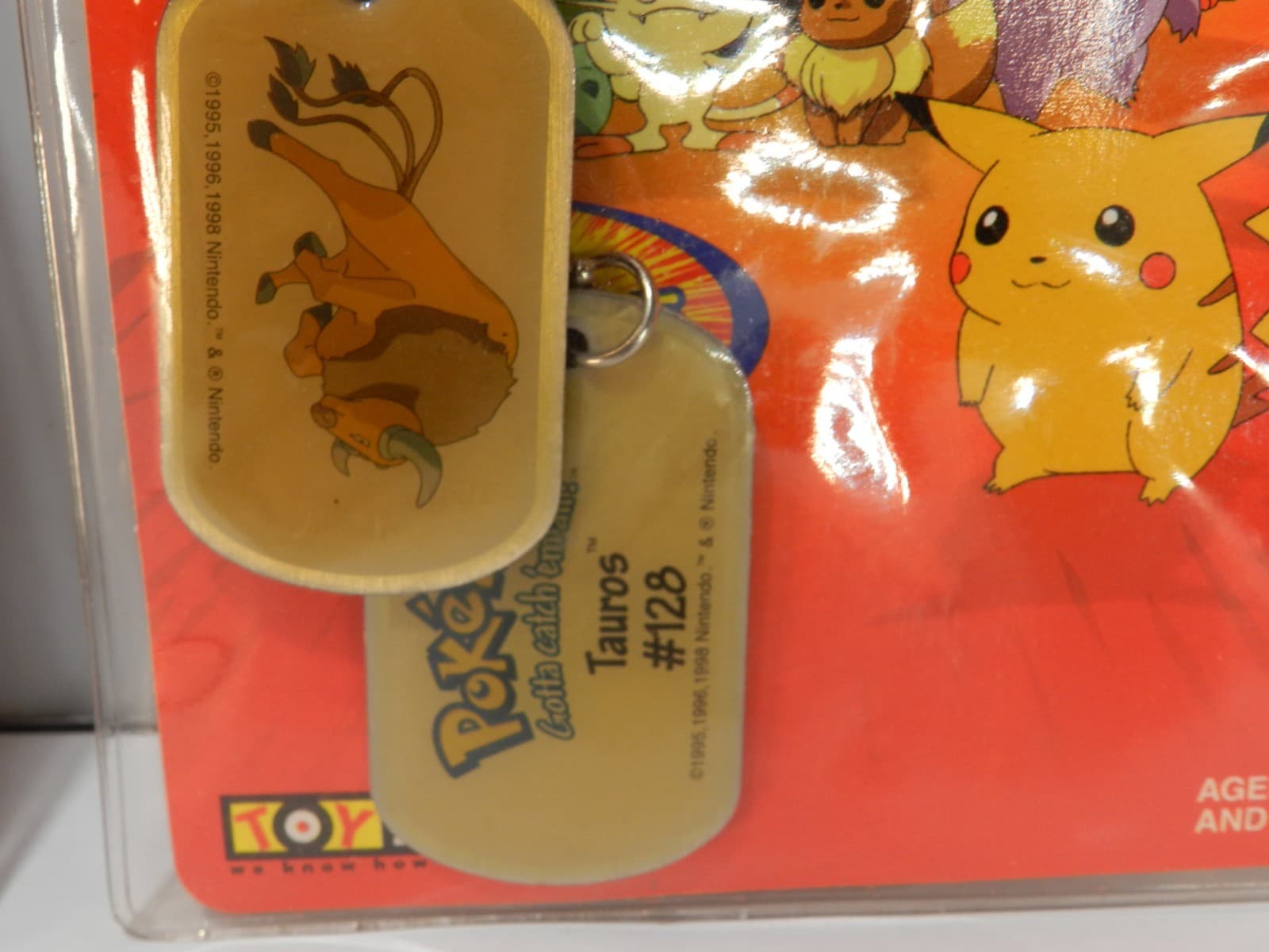 Vintage Lot Of 4 Pokémon Dog Tags 1999 (Onix , Raichu, Kabutops, Tauros) X69JJ - Thumbnail 5