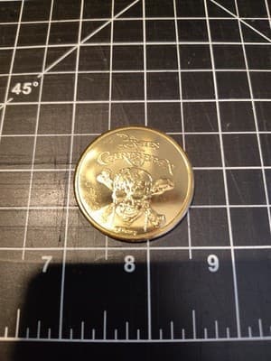 Disney Parks Gold Coin Here Comes Trouble Souvenir POTC Collectible - Thumbnail 2