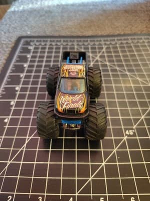 HOT WHEELS MONSTER JAM WORLD FINALS BLACK 1:64 DIECAST 3 1/2" TRUCK BLUE ORANGE