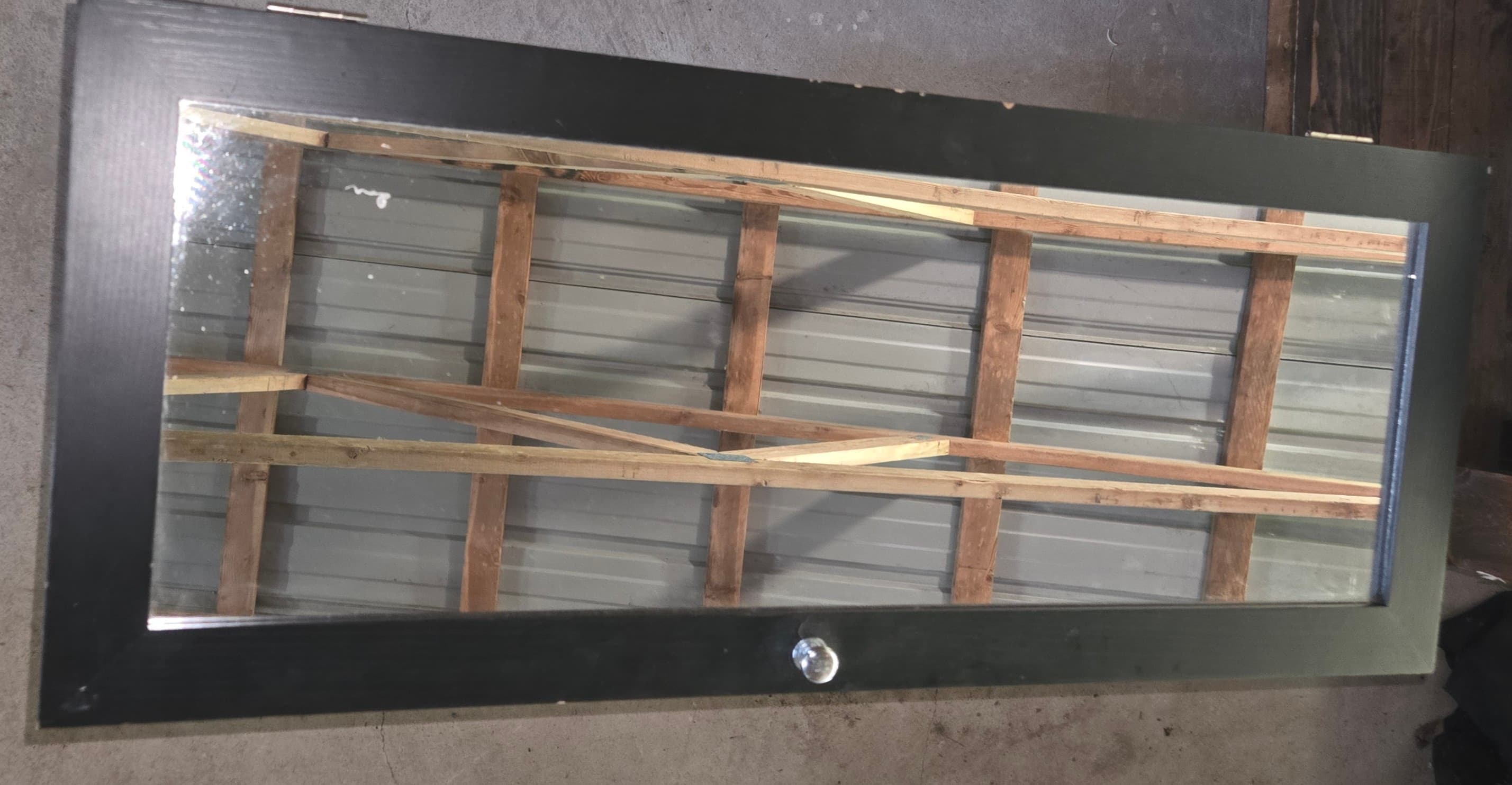Wall-Mounted Black Jewelry Cabinet with Mirror