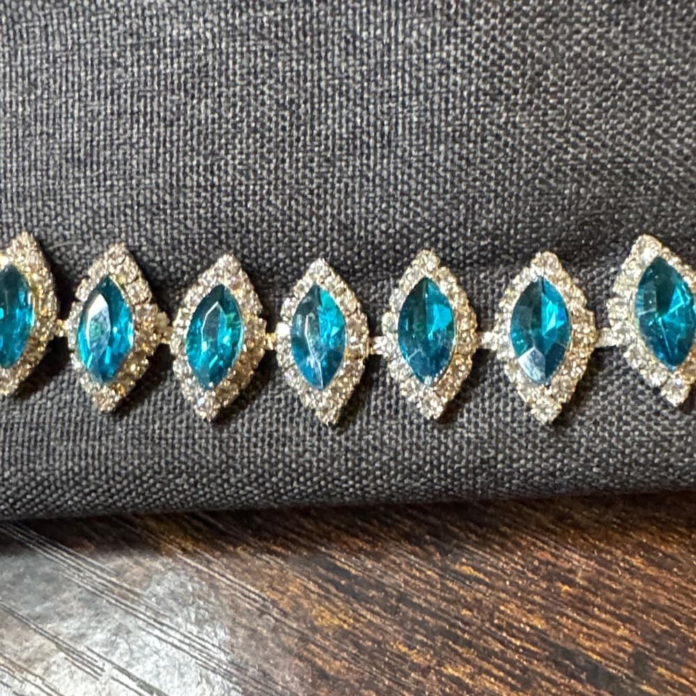 Elegant Gold and Teal Bracelet