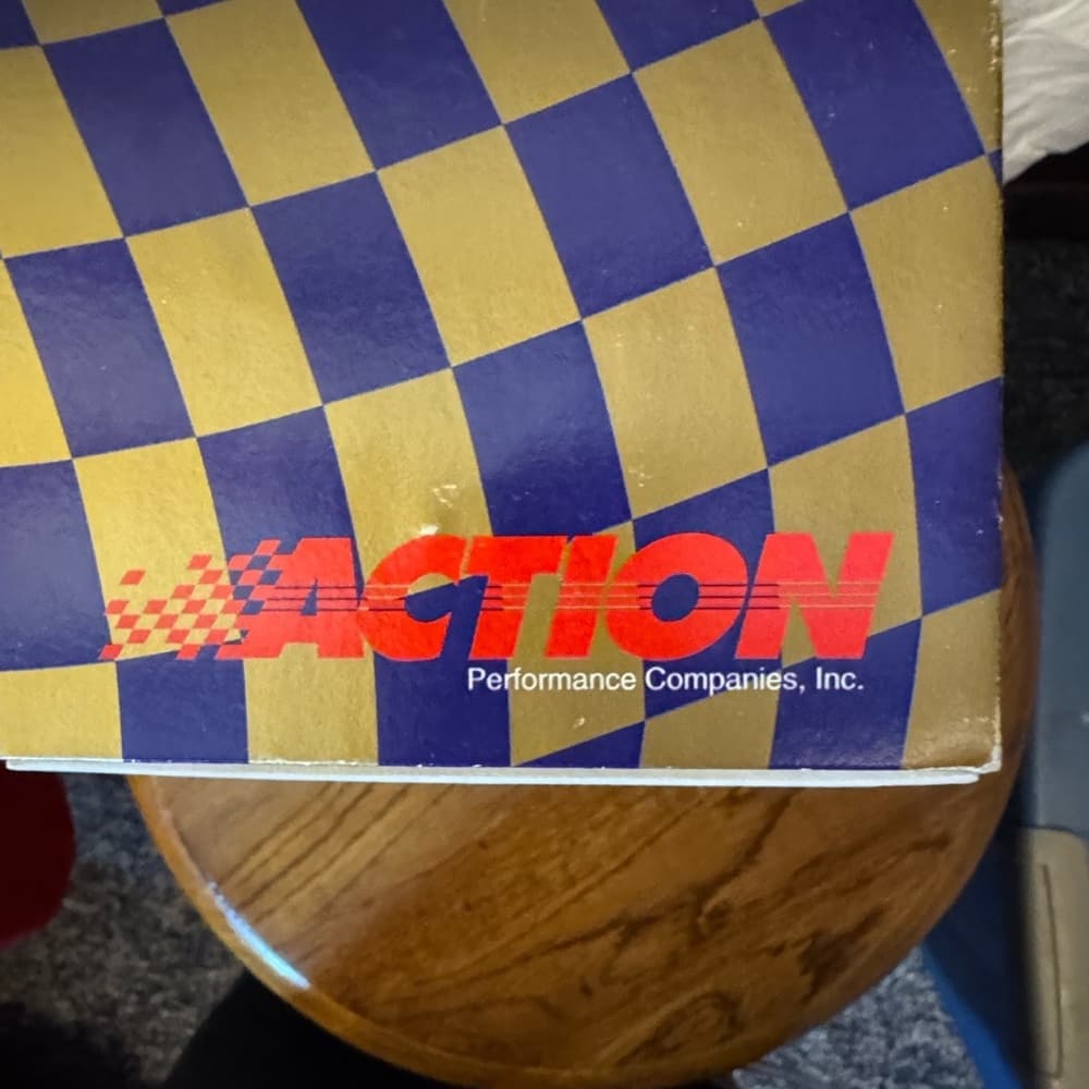 Coca-Cola Racing Gold and Blue Checkered Design