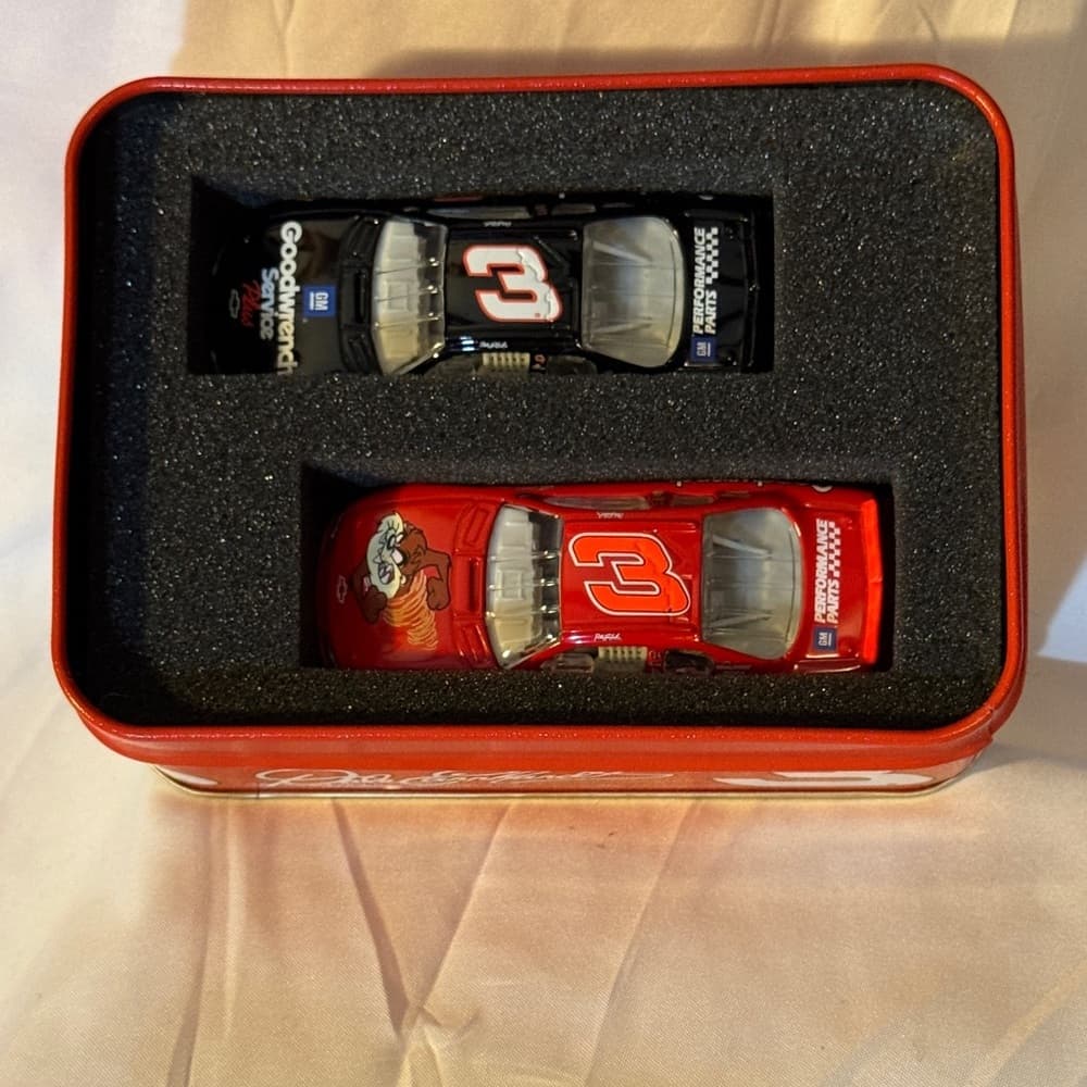 Red NASCAR Tin Box with Cartoon Design.