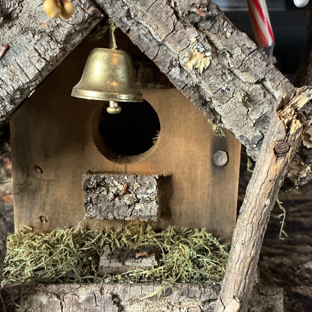 Charming Rustic Birdhouse with Bell and Red Accents