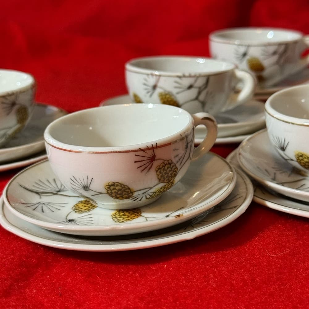 Elegant White Tea Set with Pinecone Design