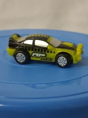 Small Hasbro Micro Machine Rally Car in Yellow & Black marked AP-100
