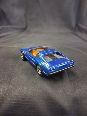 Hot Wheels | FERRARI 308 GTS | 2010 All Stars | (blue w/ tan int) (5SP) - Thumbnail 6