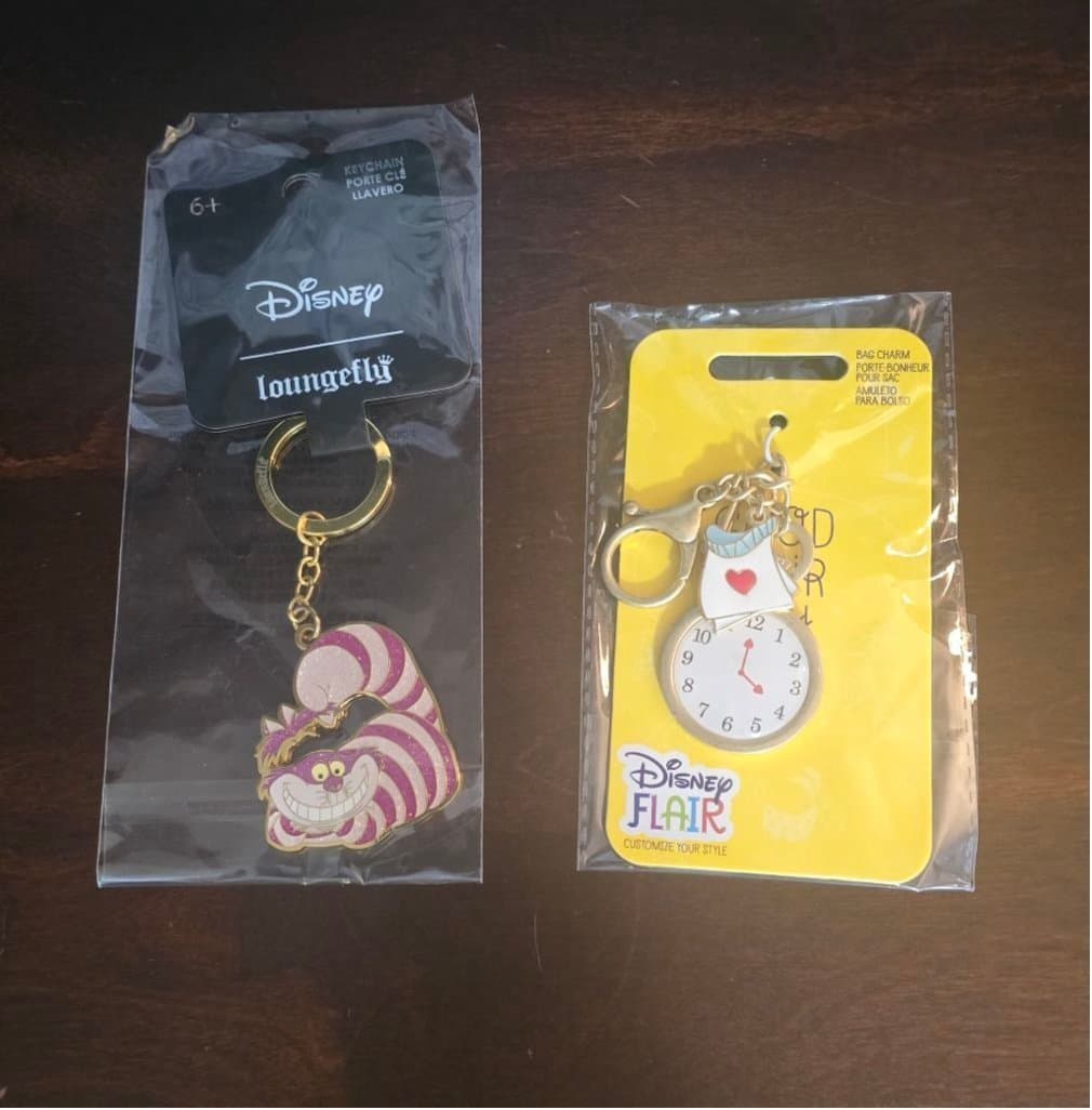 Two Alice in Wonderland Keychains