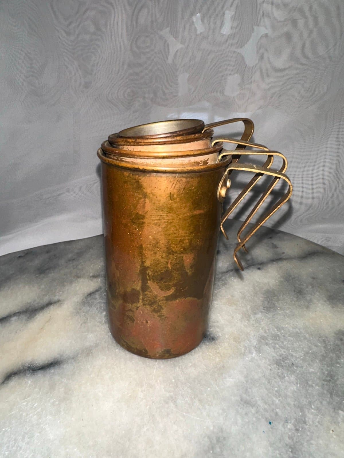 Antique 1920’s copper measuring cup set