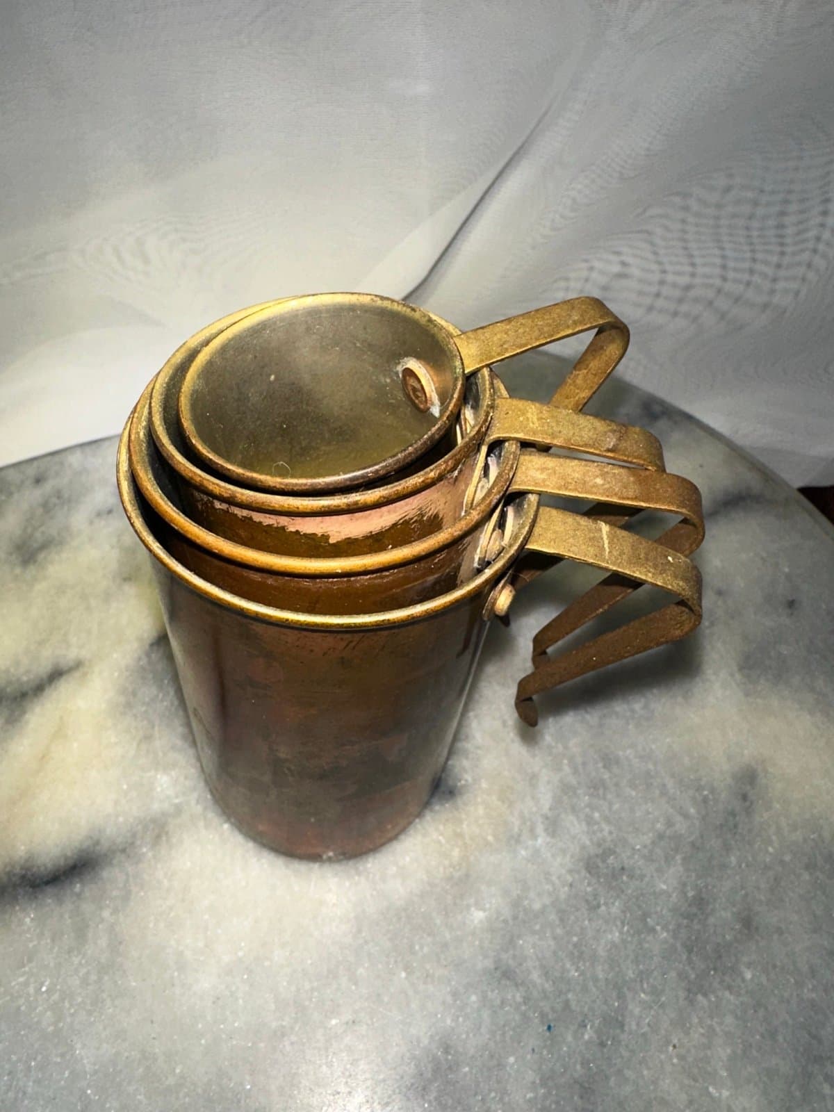 Antique 1920’s copper measuring cup set - Thumbnail 2