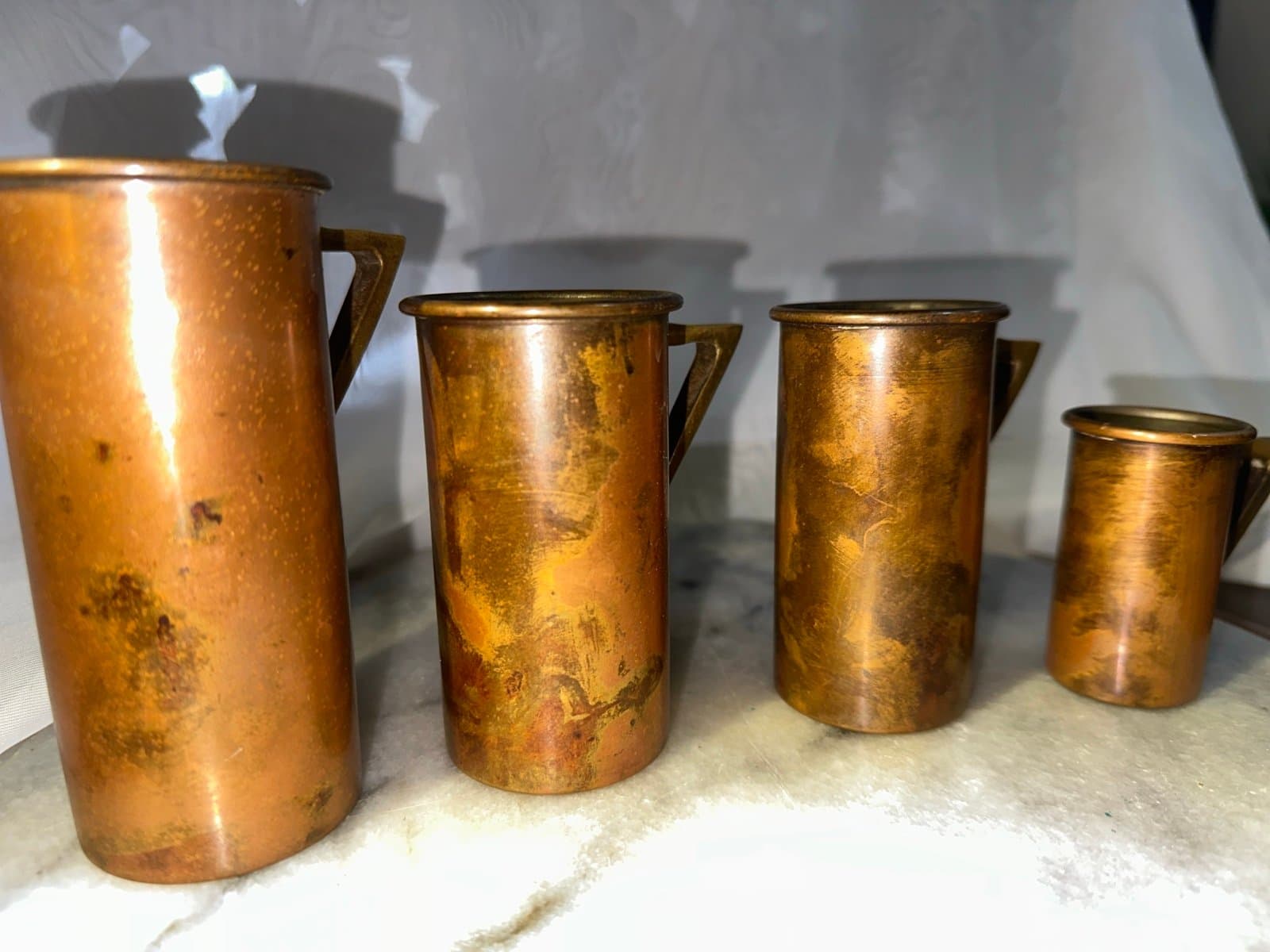 4 antique 1920s copper measuring cups with brass handles - Thumbnail 2