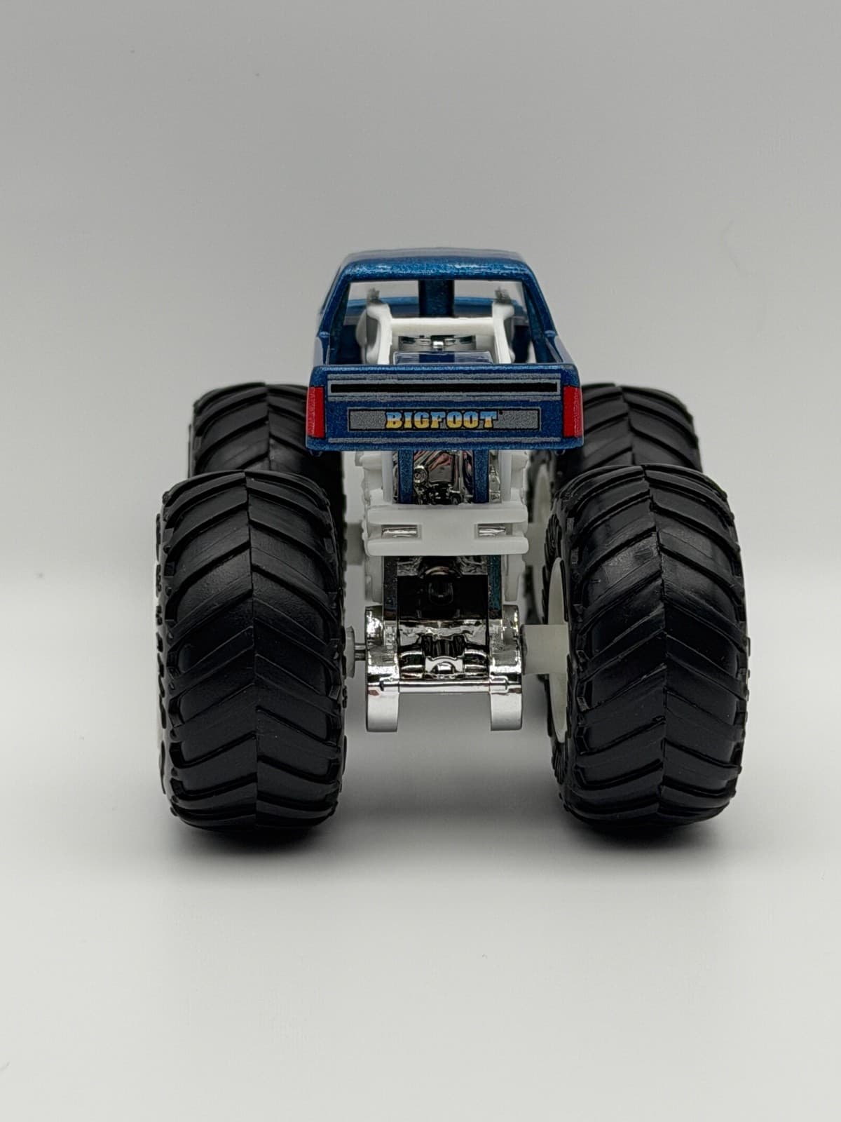 Hot Wheels Monster Trucks Bigfoot 4x4x4 Diecast Truck 1:64 Blue - Thumbnail 4