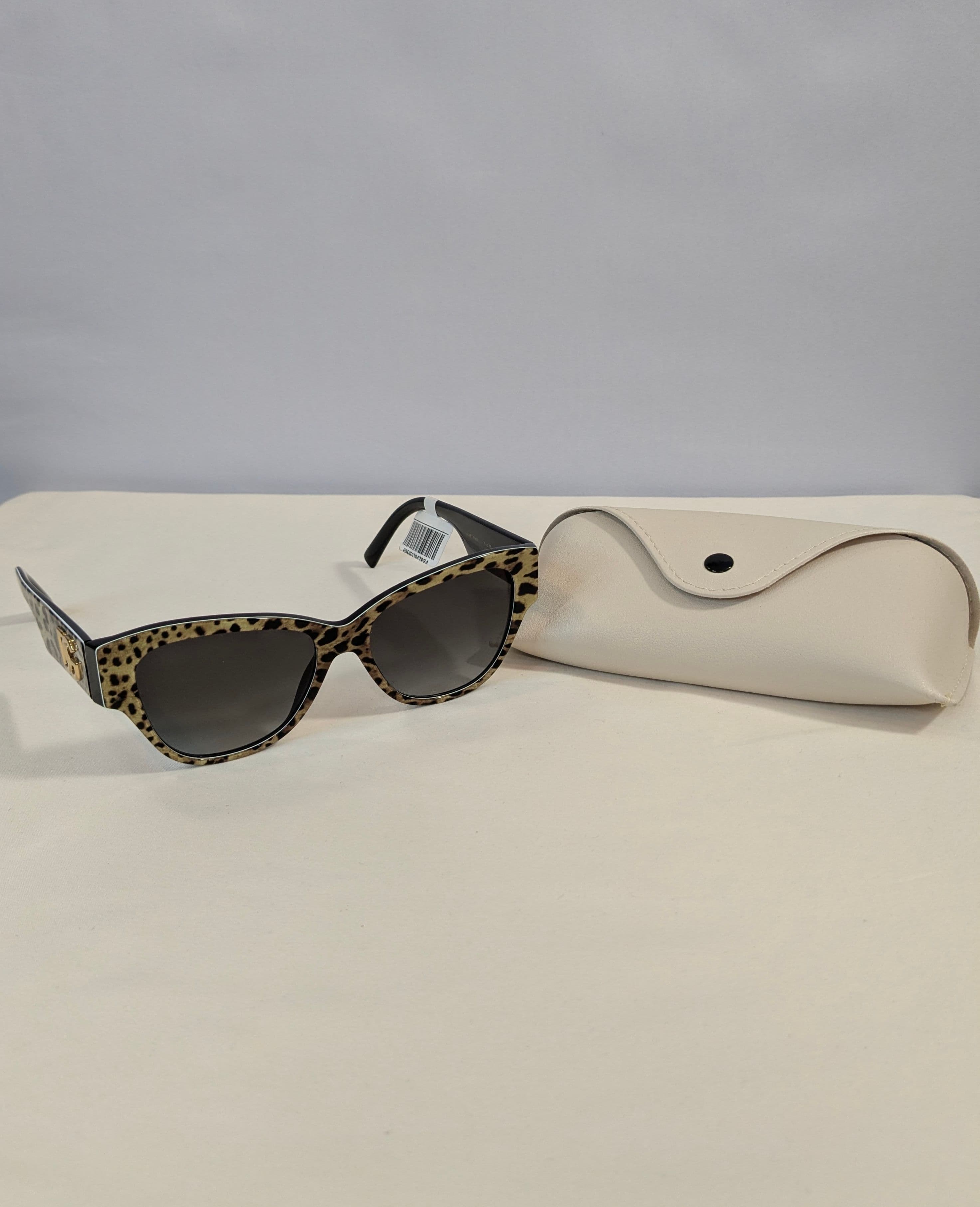 Dolce & Gabbana Leopard Cat-Eye Sunglasses with Dark Gradient Lenses and Gold DG Logo Temples