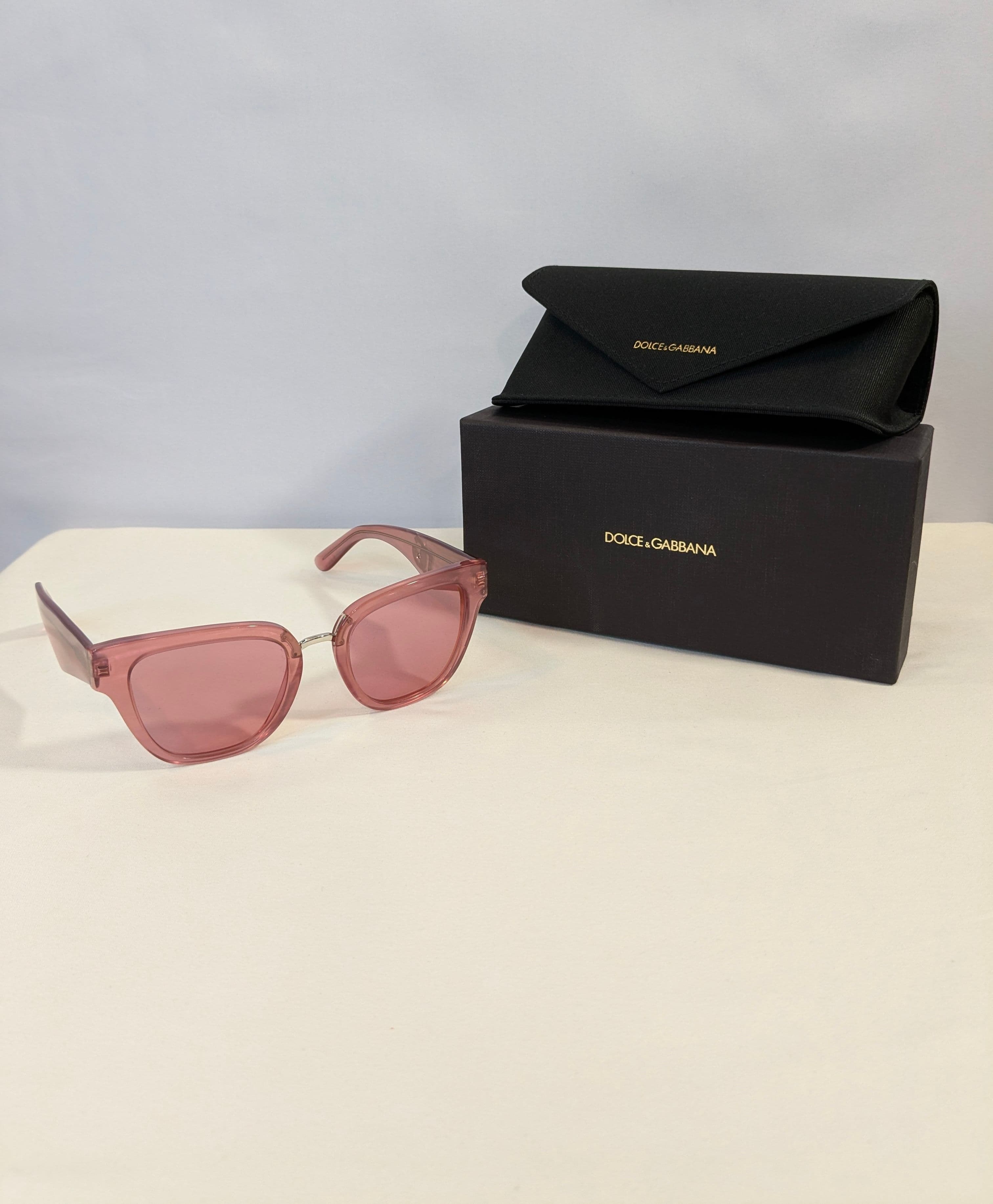 Dolce & Gabbana Transparent Pink Cat-Eye Sunglasses with Pink Tinted Lenses and Silver DG Logo Temples