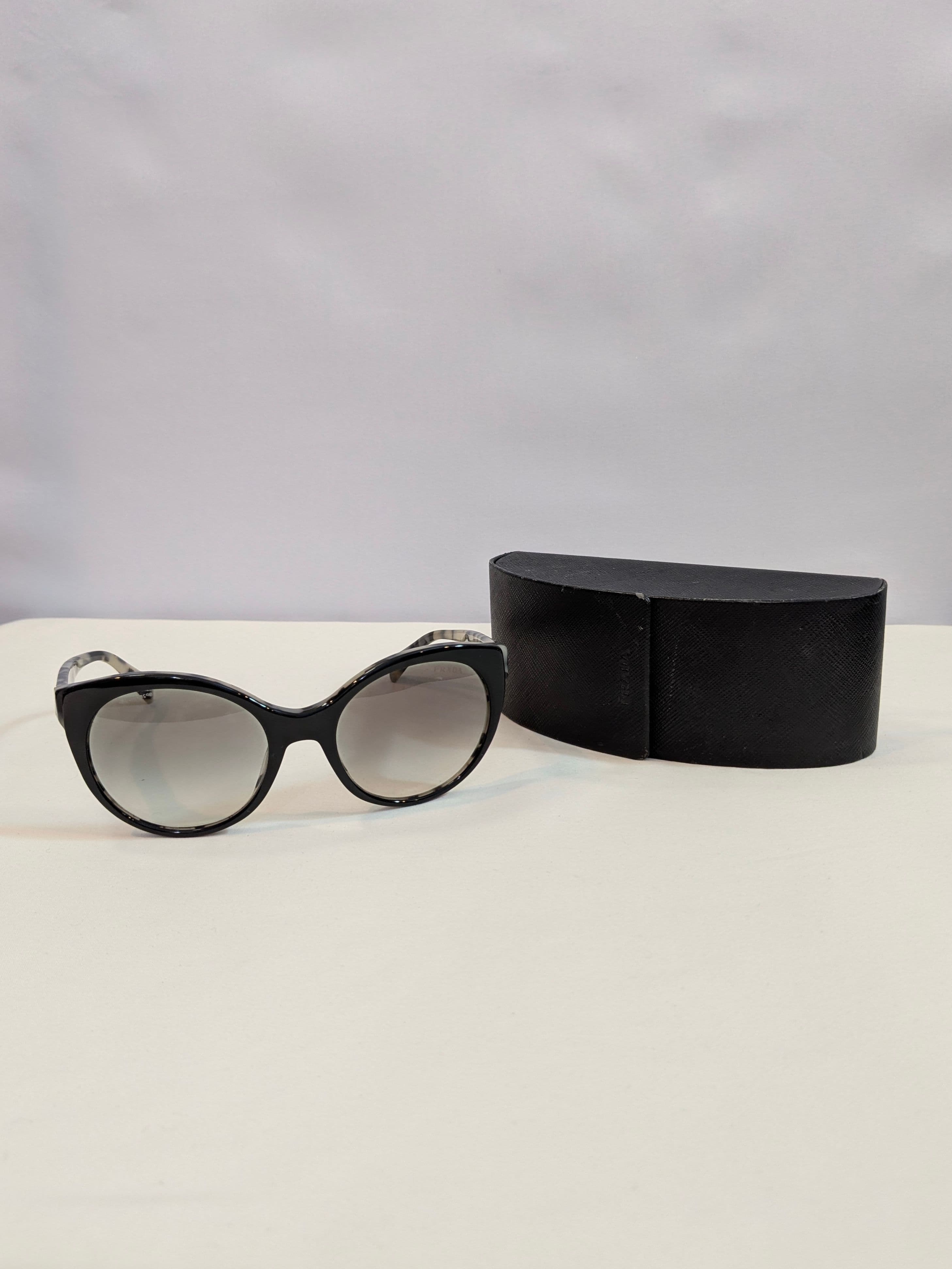 Prada Black and Ivory Marble Cat-Eye Sunglasses with Gray Gradient Lenses