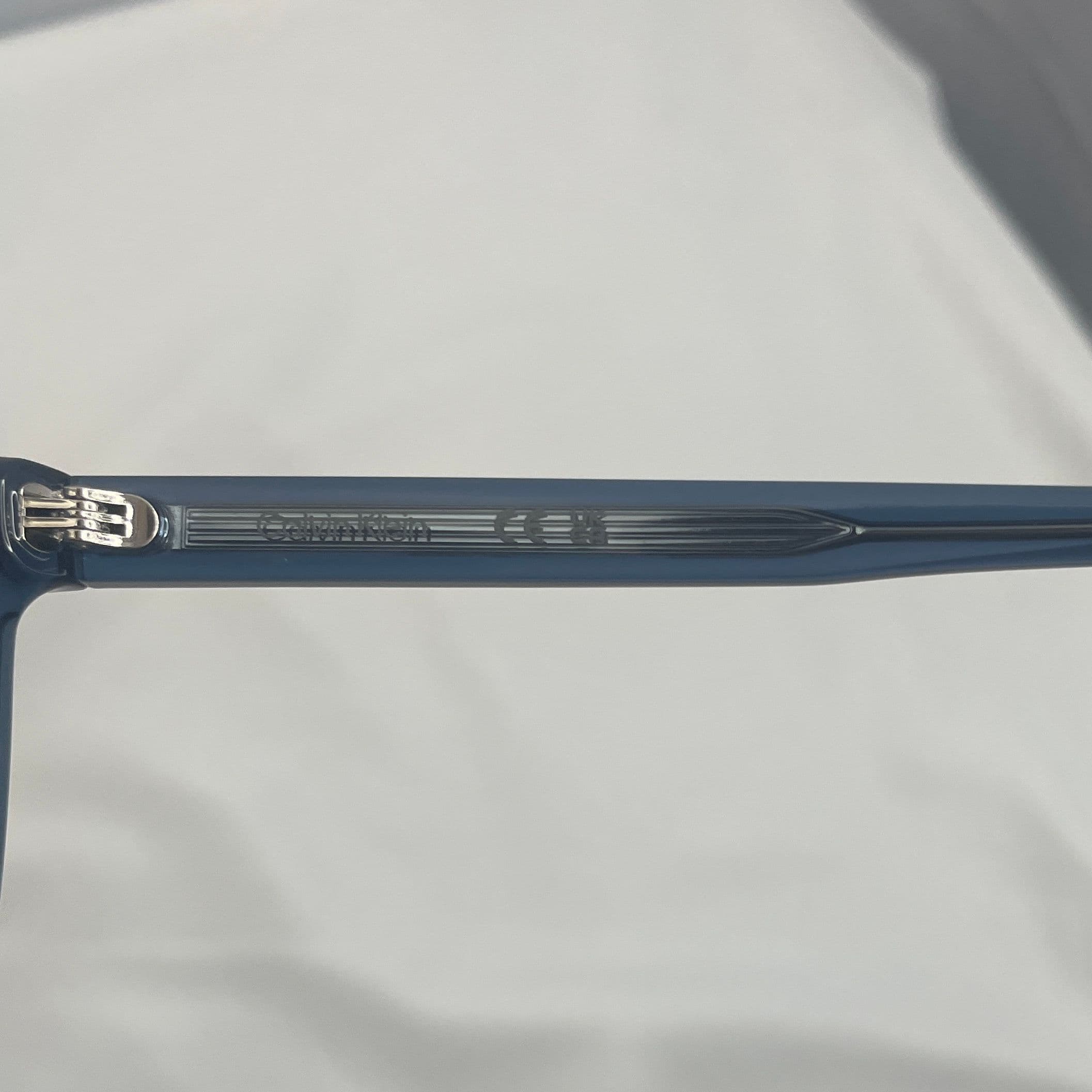 Calvin Klein Blue Rectangular Sunglasses with Blue Lenses and Keyhole Bridge - Thumbnail 5