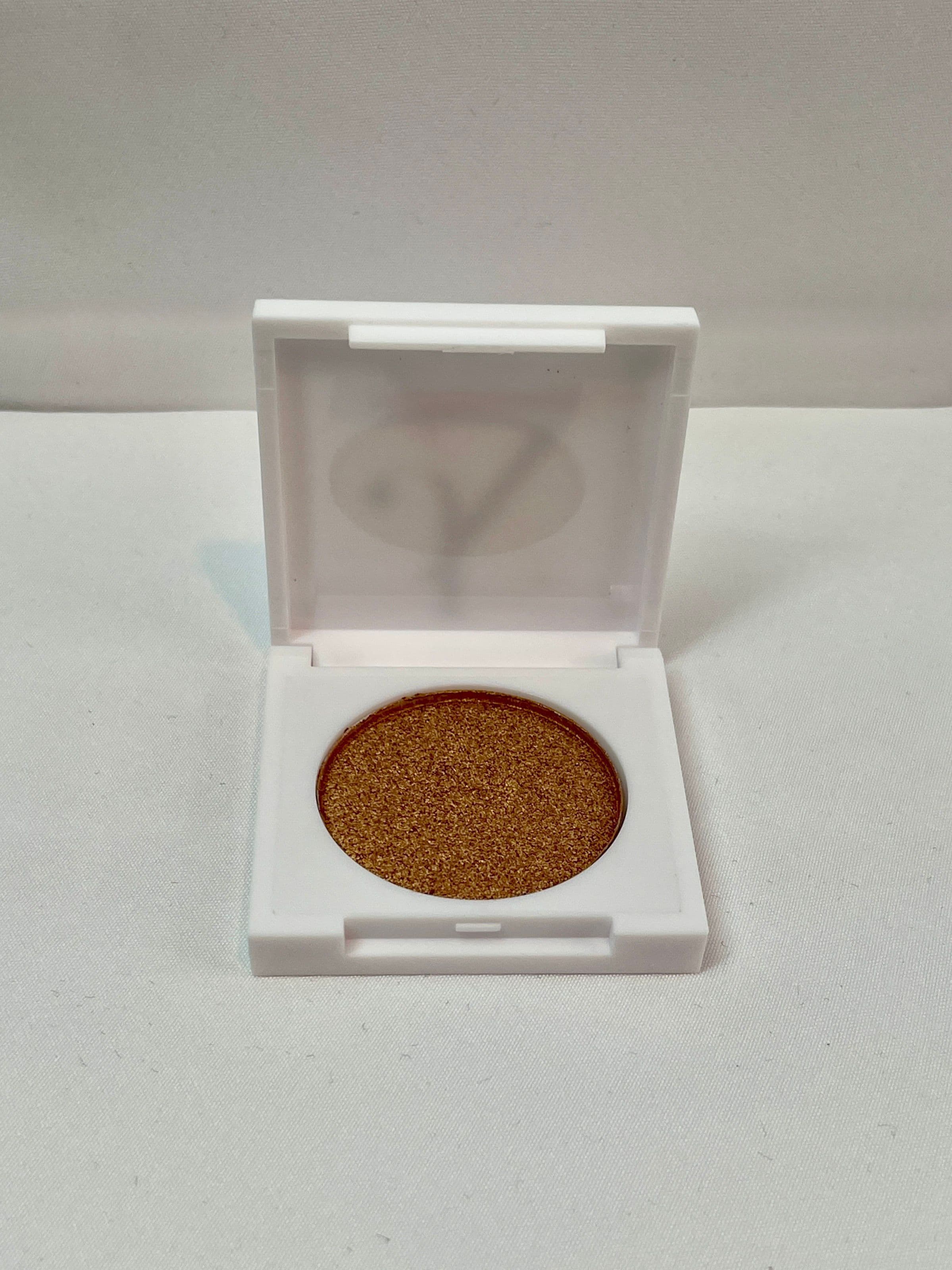 Just Ximena Sunkissed Highlighter