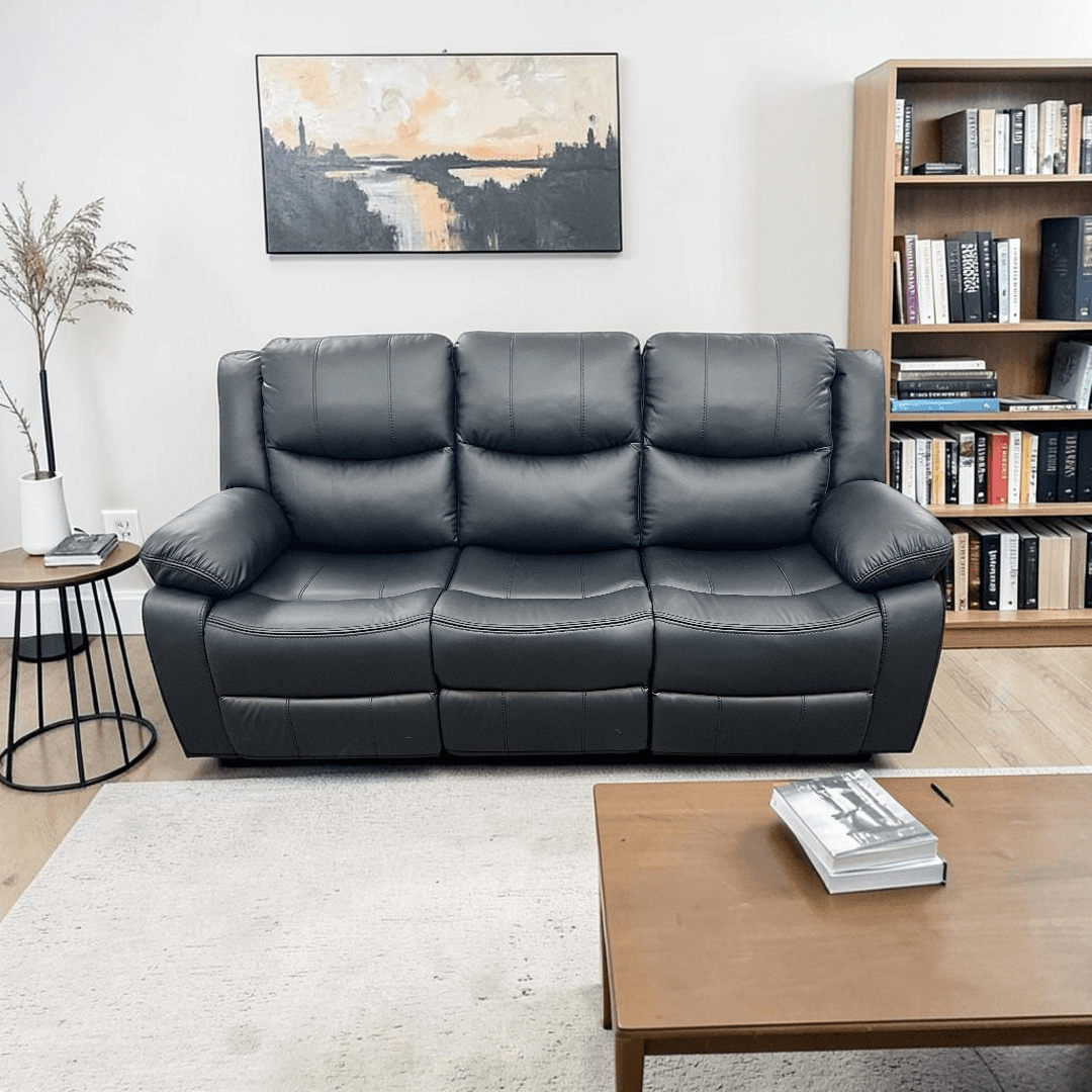 Latitude Run Kamarli Faux Leather Upholstered Solid and Manufactured Wood Frame Manual Reclining Sofa