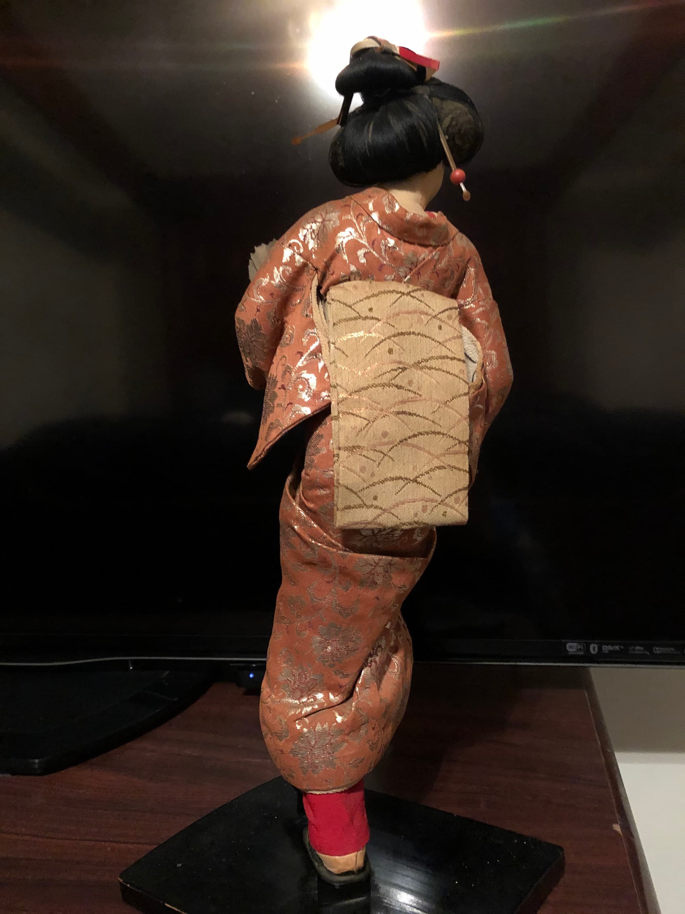 Geisha Performer with a flower bouquet on platform - Thumbnail 6