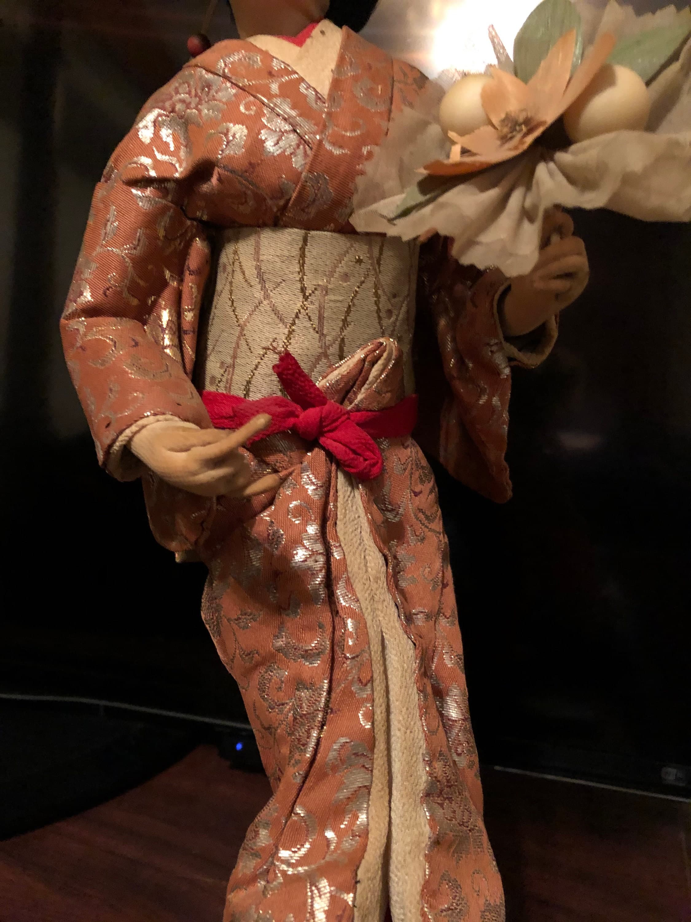 Geisha Performer with a flower bouquet on platform - Thumbnail 3
