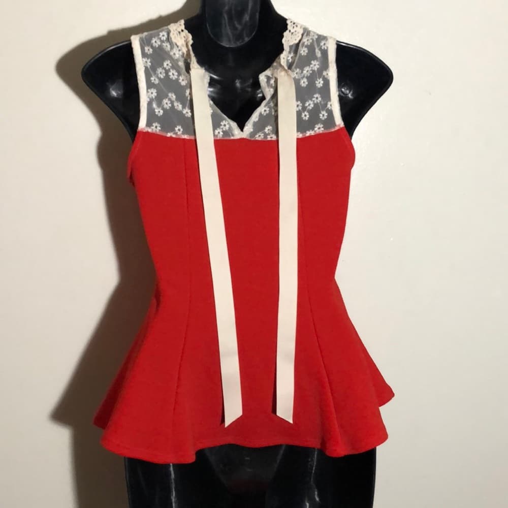 Slim fit sleeveless top with peplum flare hem - Thumbnail 2