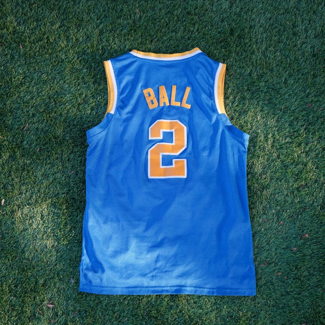 Adidas NCAA UCLA (2) Ball jersey in powder blue and gold. Size adult small. Features stitched graphics on the front and the back. - Thumbnail 5