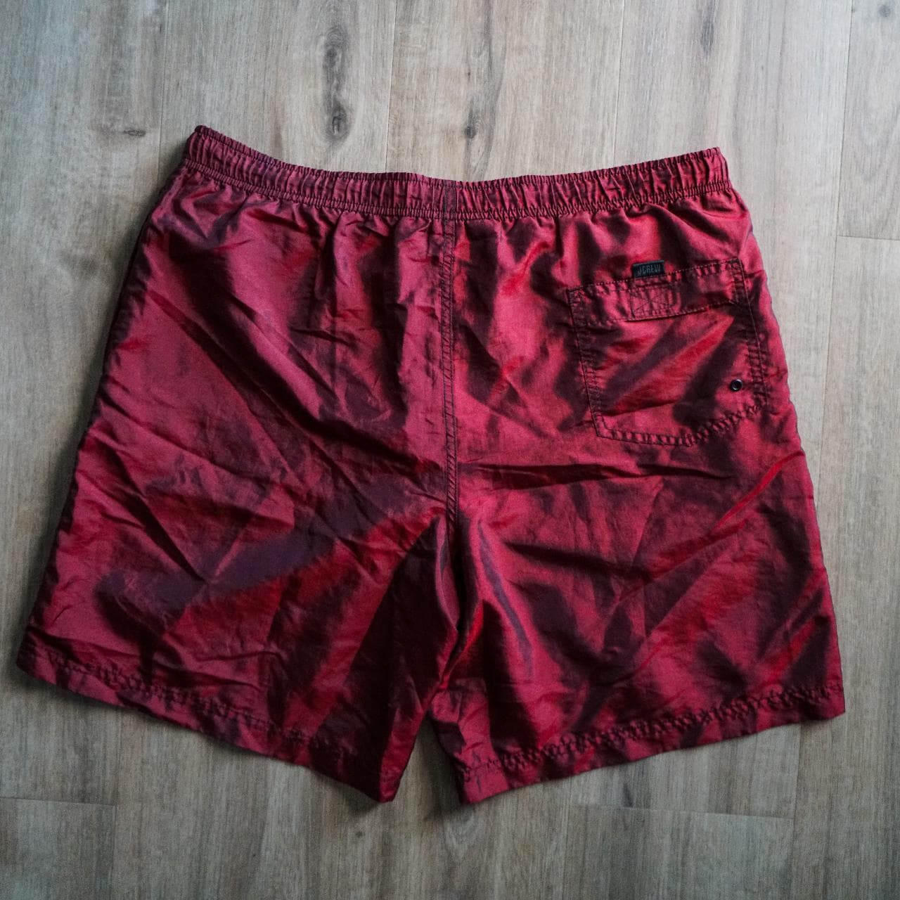 Vintage #JCrew swim trunks in deep red. Semi reflective finish with monotone J. Crew logo on leg. Size Large. - Thumbnail 4
