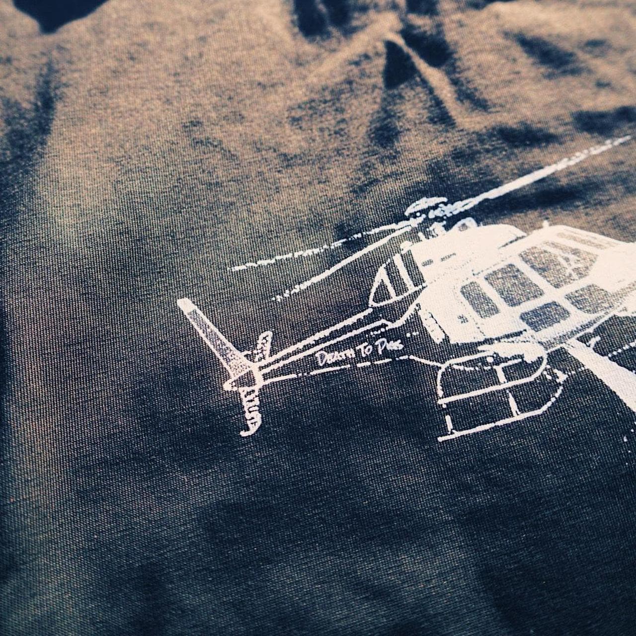 Abolish ICE collage tee from Neon Gymnasium. Collage graphic on the front with helicopter graphic on the back. - Thumbnail 3