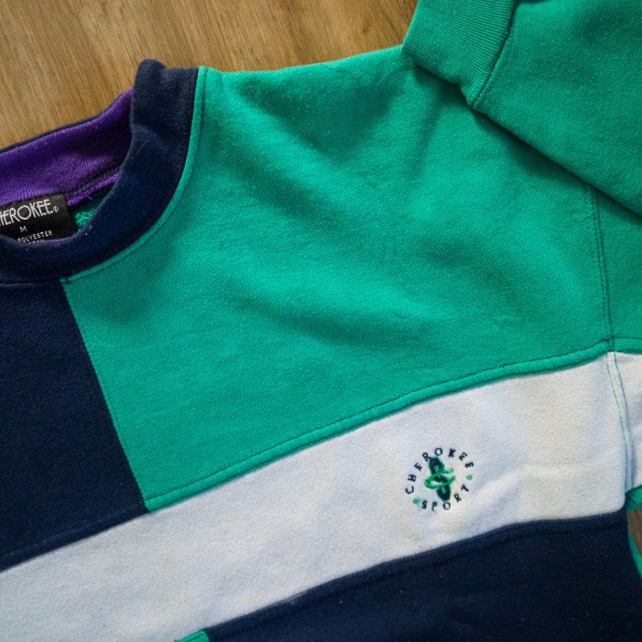 Vintage #Cherokee pullover #sweatshirt with color blocking. Green and navy with a hint of purple around the collar. Small branding on front left chest with exaggerated stitching throughout. #90s - Thumbnail 2