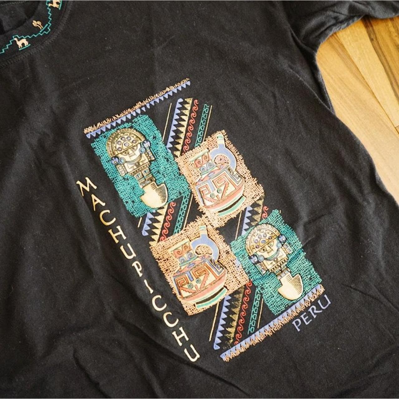 Machu Piccu resort tee in Black with graphics on front and along the neck. Size Medium 🌵 - Thumbnail 2