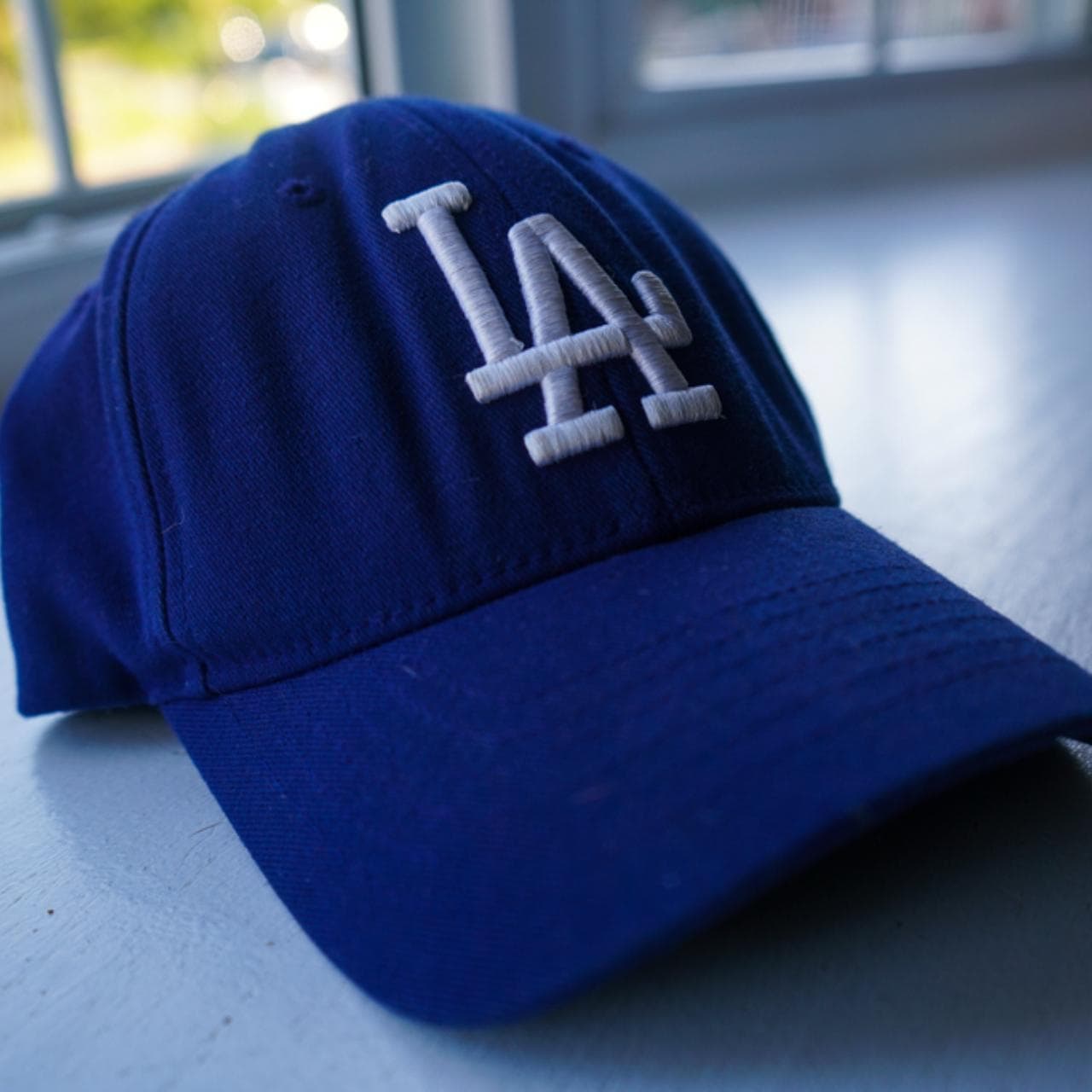 Adjustable #LA #Dodgers hat in navy. #NewEra baseball cap with #MLB branding on back and sliding closure.